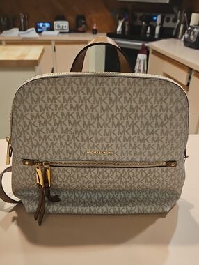 Michael Kors Monogram Slim Backpack in Light Beige and Tan Trim